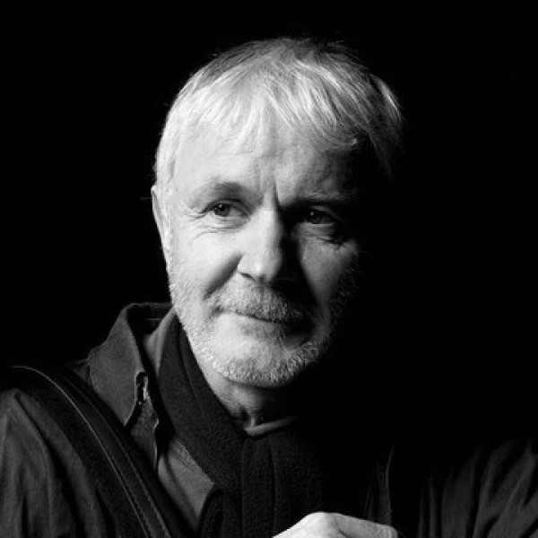 Máirtín O'Connor in monochrome. He looks to the right.