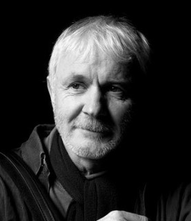 Máirtín O'Connor in monochrome. He looks to the right.