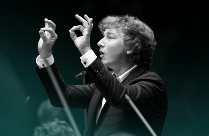 Maxim conducts the Orchestra