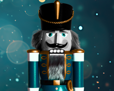 A blue nutcracker soldier is featured with a blue glistening backdrop.