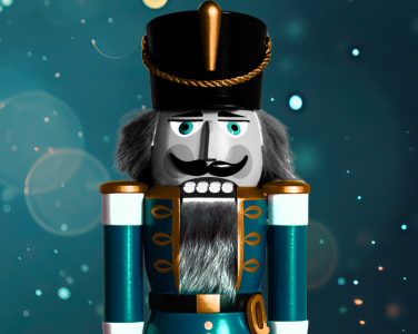 A blue nutcracker soldier is featured with a blue glistening backdrop.
