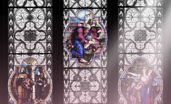 A ray of sun shines over stained glass.