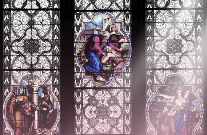 A ray of sun shines over stained glass.