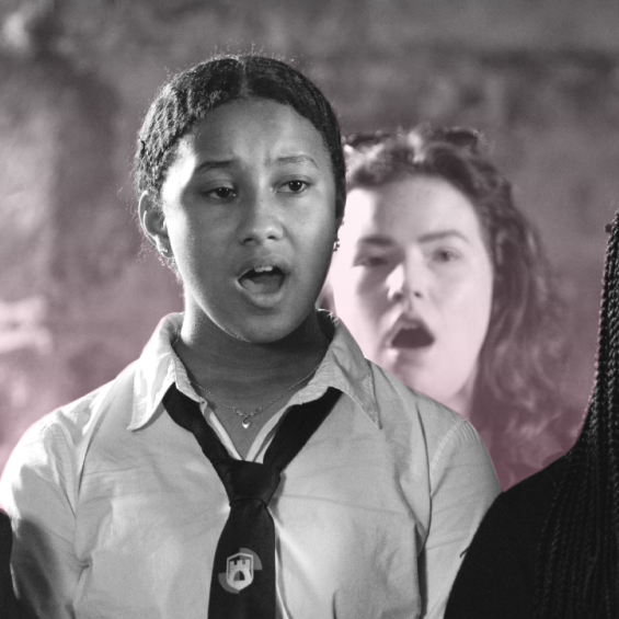 3 members of the Craigmillar youth choir sing, they wear school unirom.