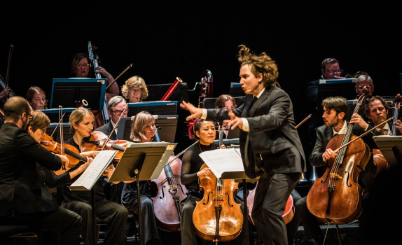 Maxim conducts wildly