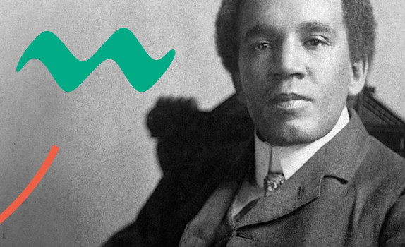 A historic photograph of Samuel Taylor-Coleridge sitting in a chair, wearing a suit.