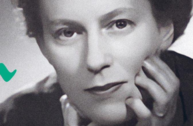 Composer Ruth Gipps leaning forward with both hands gently touching her face.