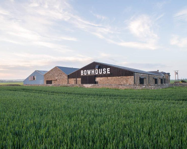 The Bowhouse in St Monans, photographed from across a field.
