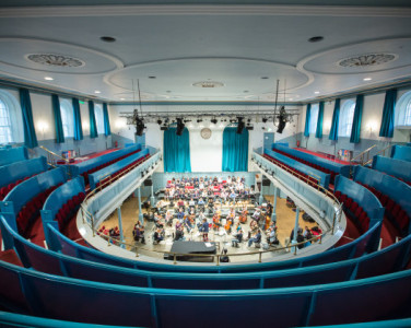 The view of the stage in the Queen's Hall from the back of the gallery during a rehearsal.