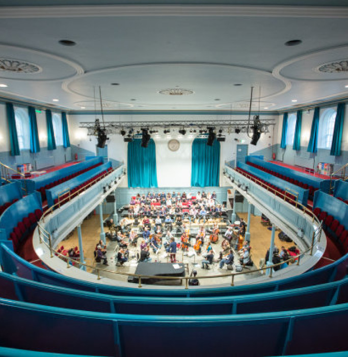 The view of the stage in the Queen's Hall from the back of the gallery during a rehearsal.